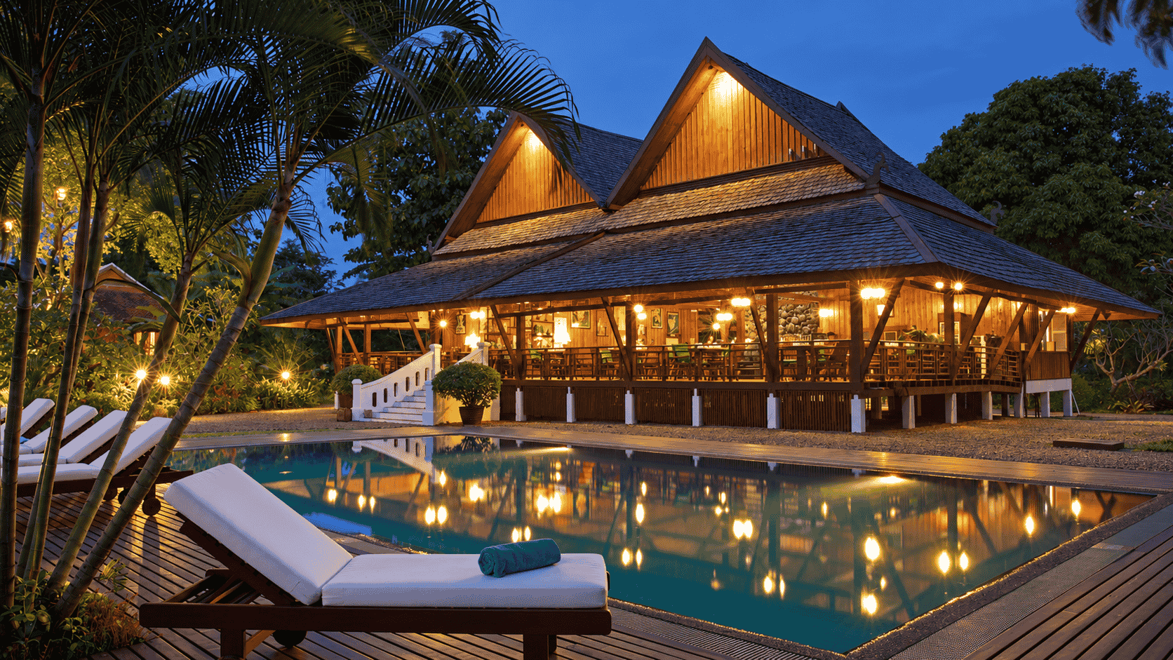 The pool and restaurant pavilion as evening turns to blue.