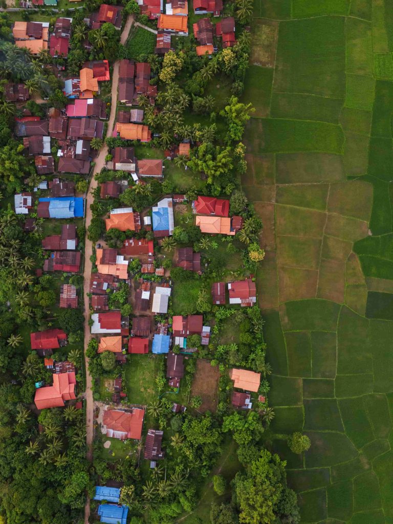 Houses and fields share the same small corner of the island.