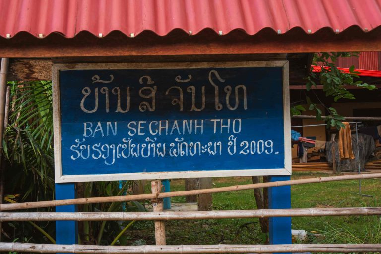 A village sign along the island’s paths.